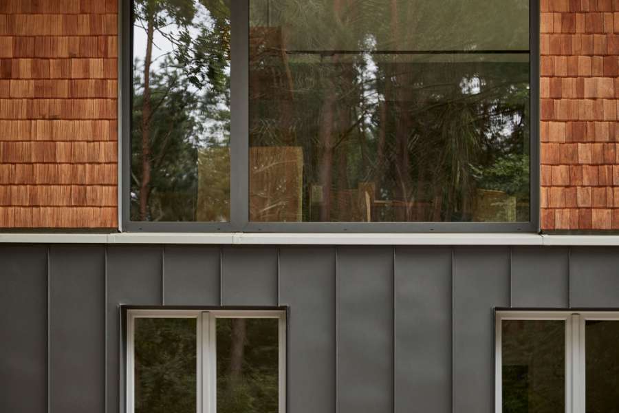 Half’n’half cladding with wood and steel, Schleusenberg 1, 23896 Panten